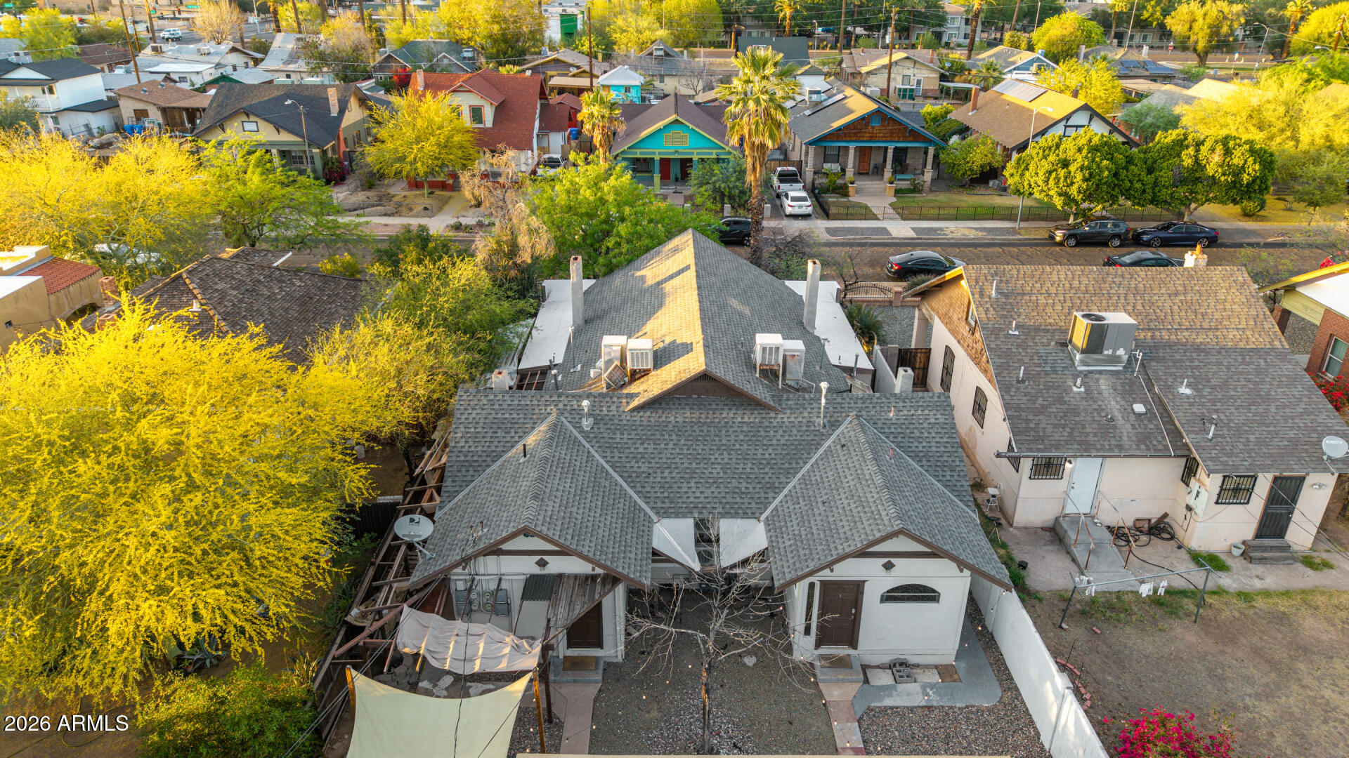 1317 West Monroe Street Phoenix, AZ 85007 - Photo 8 of 86 an aerial view of residential houses with outdoor space and swimming pool