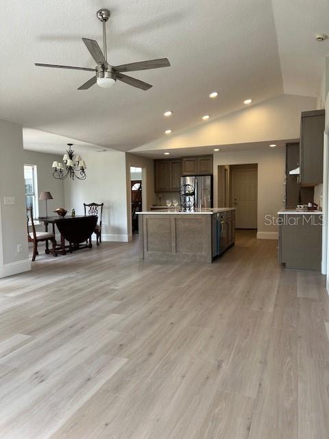 2800 Conway Gardens Road Orlando, FL 32806 - Photo 9 of 23 a view of a kitchen with furniture and a chandelier
