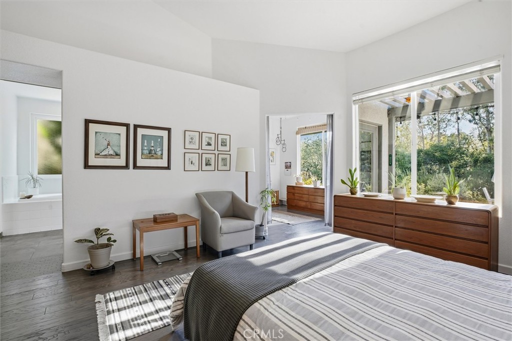 649 Asilo Arroyo Grande, CA 93420 - Photo 19 of 39 a bedroom with furniture and a large window