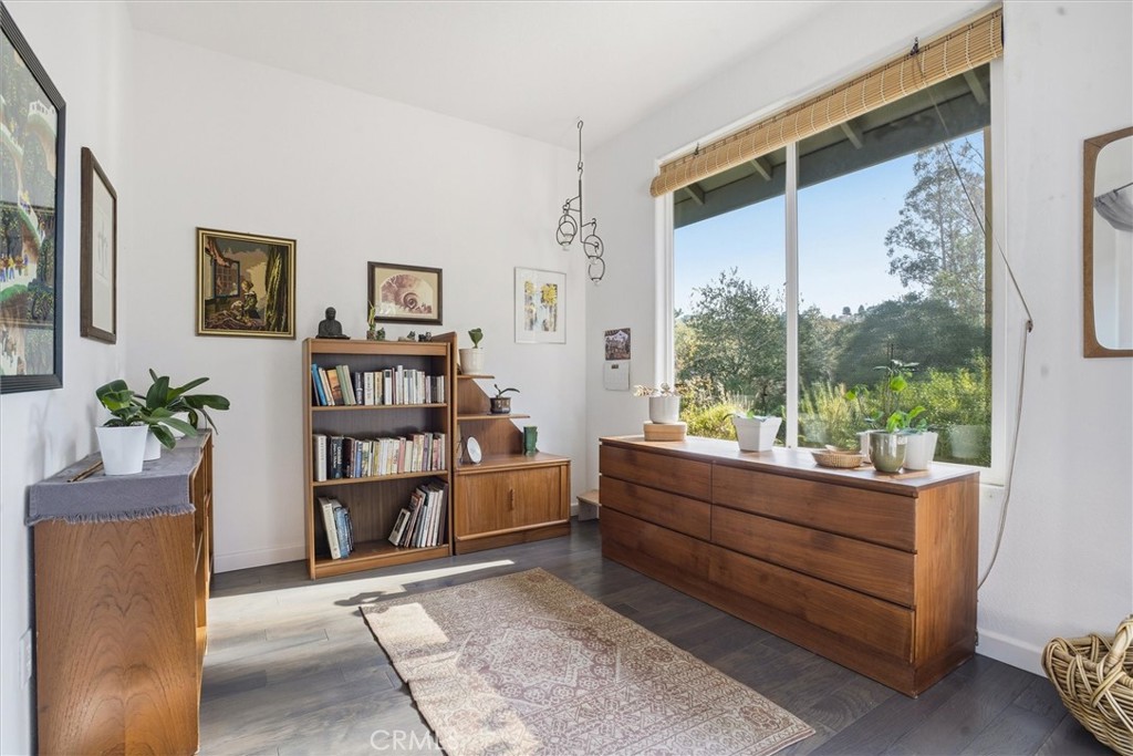 649 Asilo Arroyo Grande, CA 93420 - Photo 20 of 39 a room with furniture and a book shelf