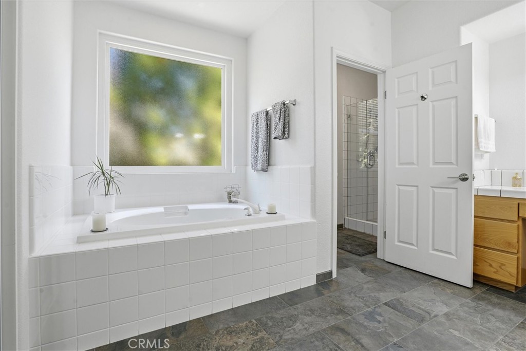 649 Asilo Arroyo Grande, CA 93420 - Photo 23 of 39 a bathroom with a sink and a mirror