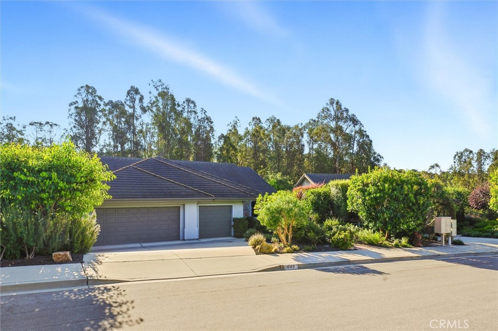 649 Asilo Arroyo Grande, CA 93420 - Photo 38 of 39 a front view of a house with a yard and garage