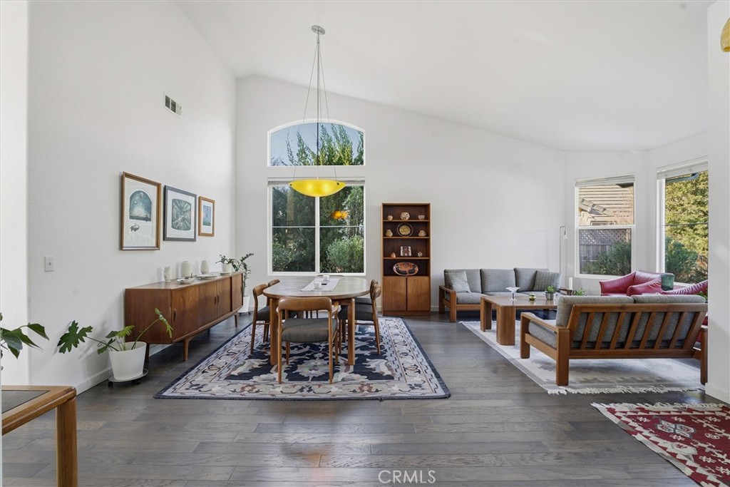 649 Asilo Arroyo Grande, CA 93420 - Photo 4 of 39 a living room with furniture a chandelier and a table