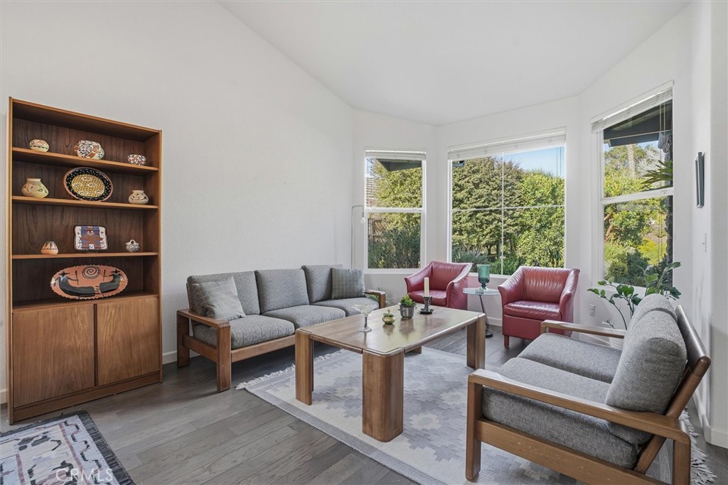 649 Asilo Arroyo Grande, CA 93420 - Photo 5 of 39 a living room with furniture and a floor to ceiling window