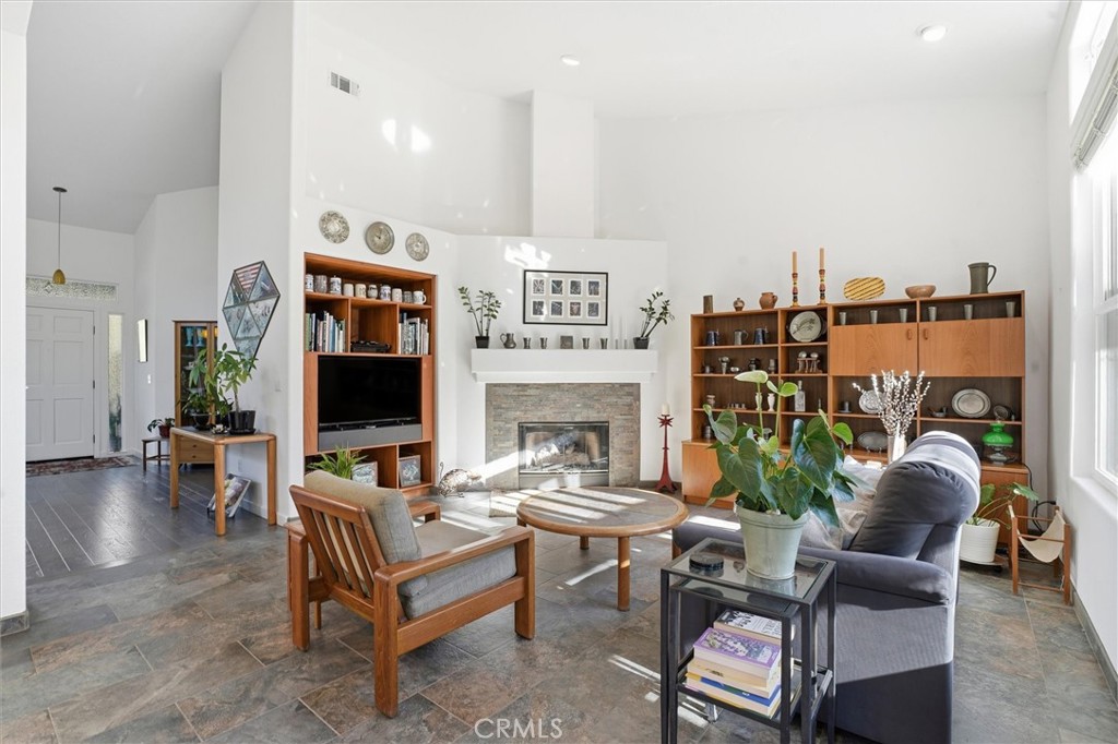 649 Asilo Arroyo Grande, CA 93420 - Photo 9 of 39 a living room with furniture and a fireplace
