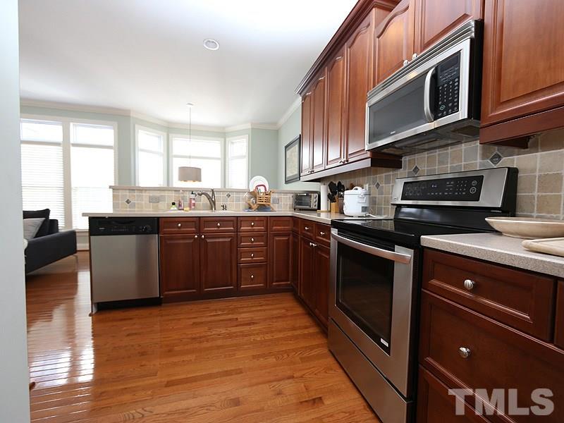 1175 Harp Street Raleigh, NC 27604 - Photo 23 of 24 Spacious Kitchen part of the Open Floor Plan with Butlers Pantry/Bar area