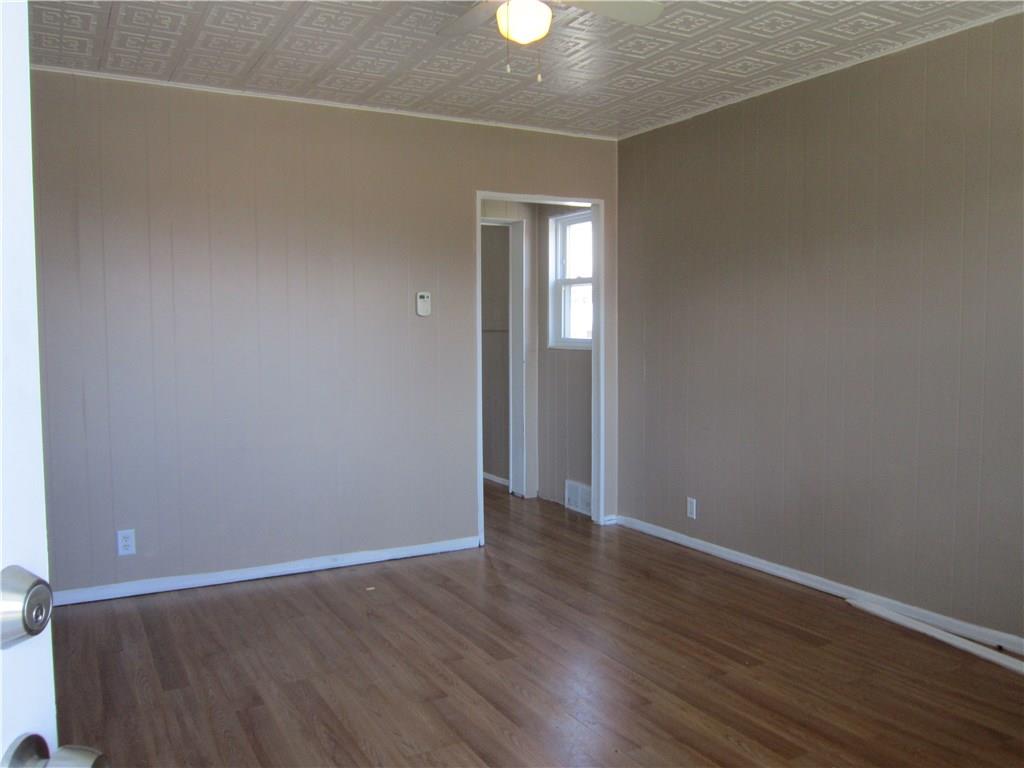 1210 3rd Street McKees Rocks, PA 15136 - Photo 5 of 25 Living room leads to the dinning/kitchen room.