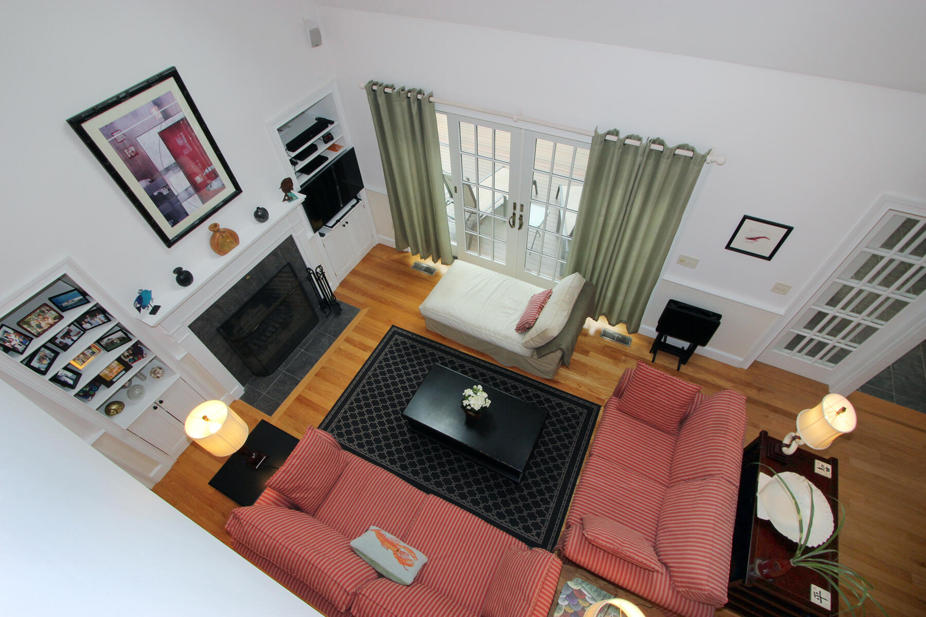 195 Cathedral Road Brewster, MA 02631 - Photo 30 of 54 a living room with furniture and a floor to ceiling window