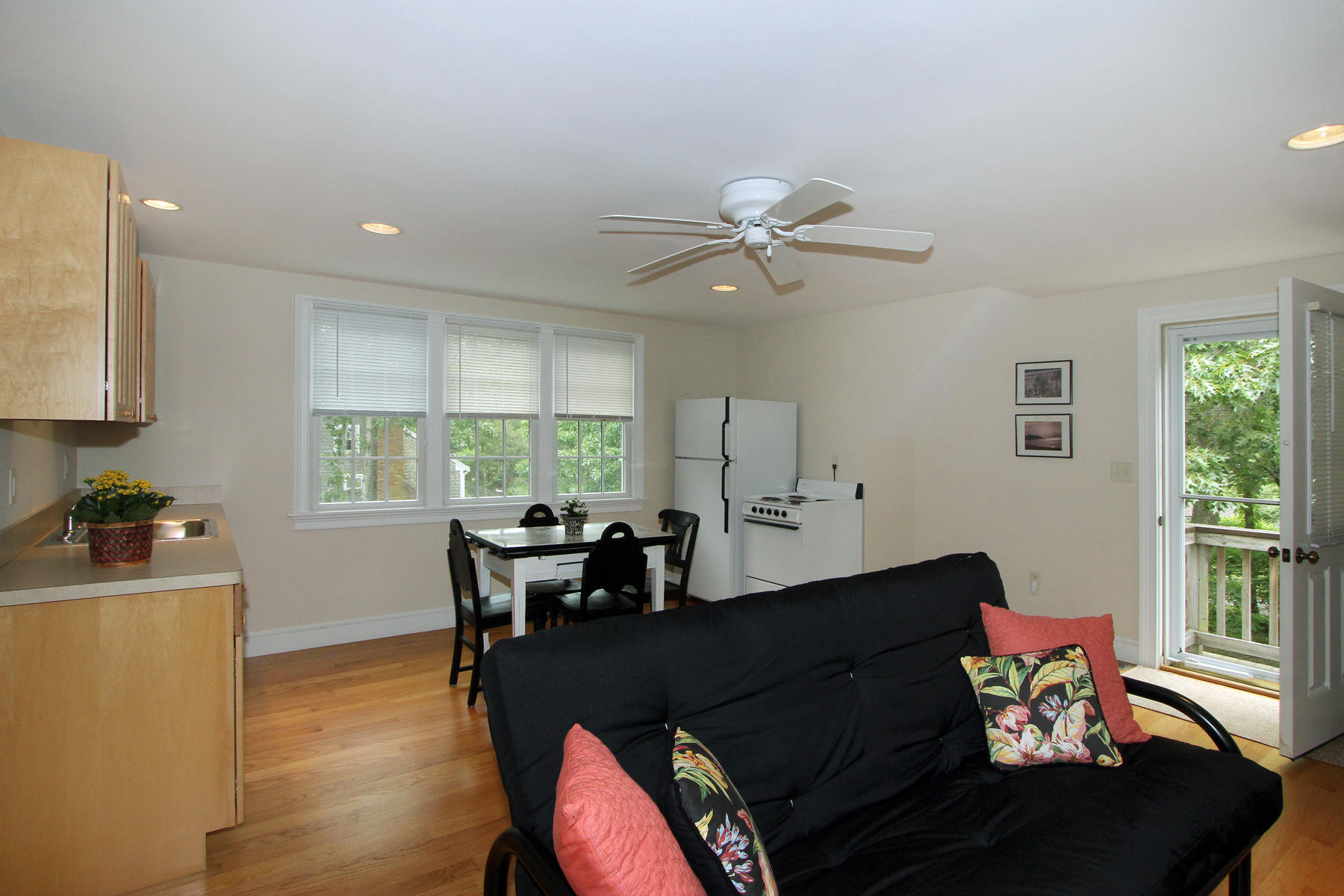 195 Cathedral Road Brewster, MA 02631 - Photo 36 of 54 a living room with furniture and a large window