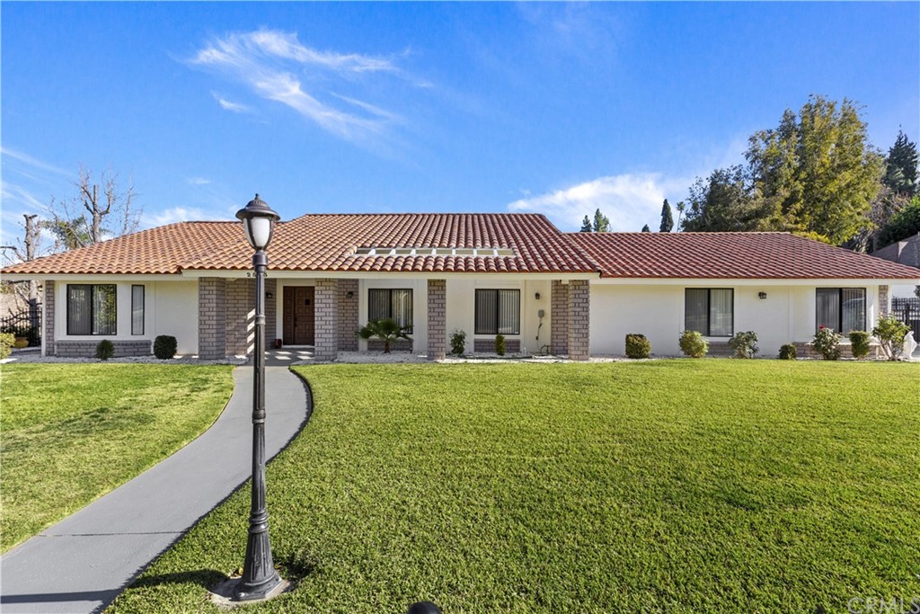 2535 Amy Way Riverside, CA 92506 - Photo 1 of 1 a front view of a house with a yard