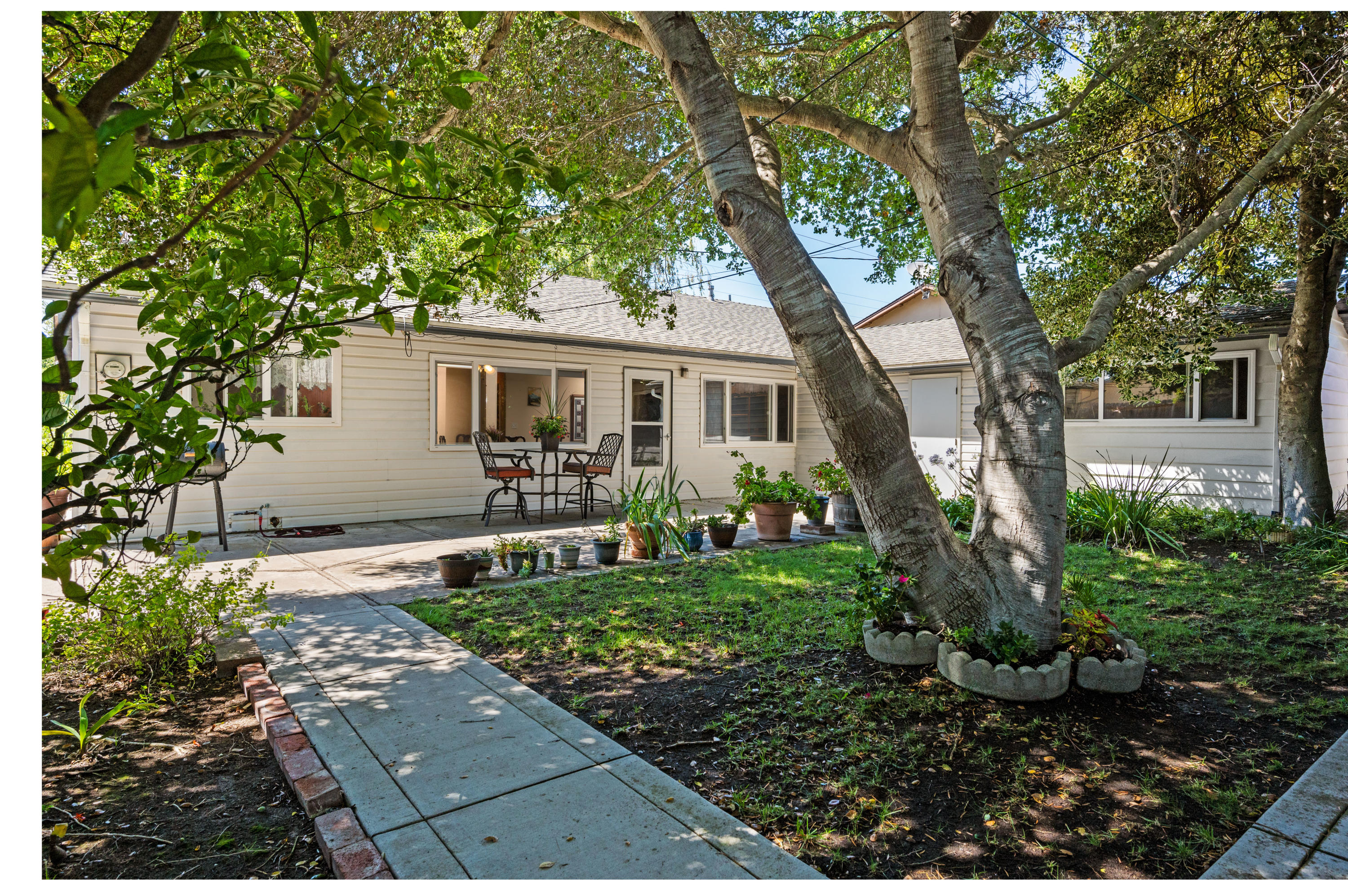 3432 Rucker Road Lompoc, CA 93436 - Photo 1 of 17 a front view of a house with garden