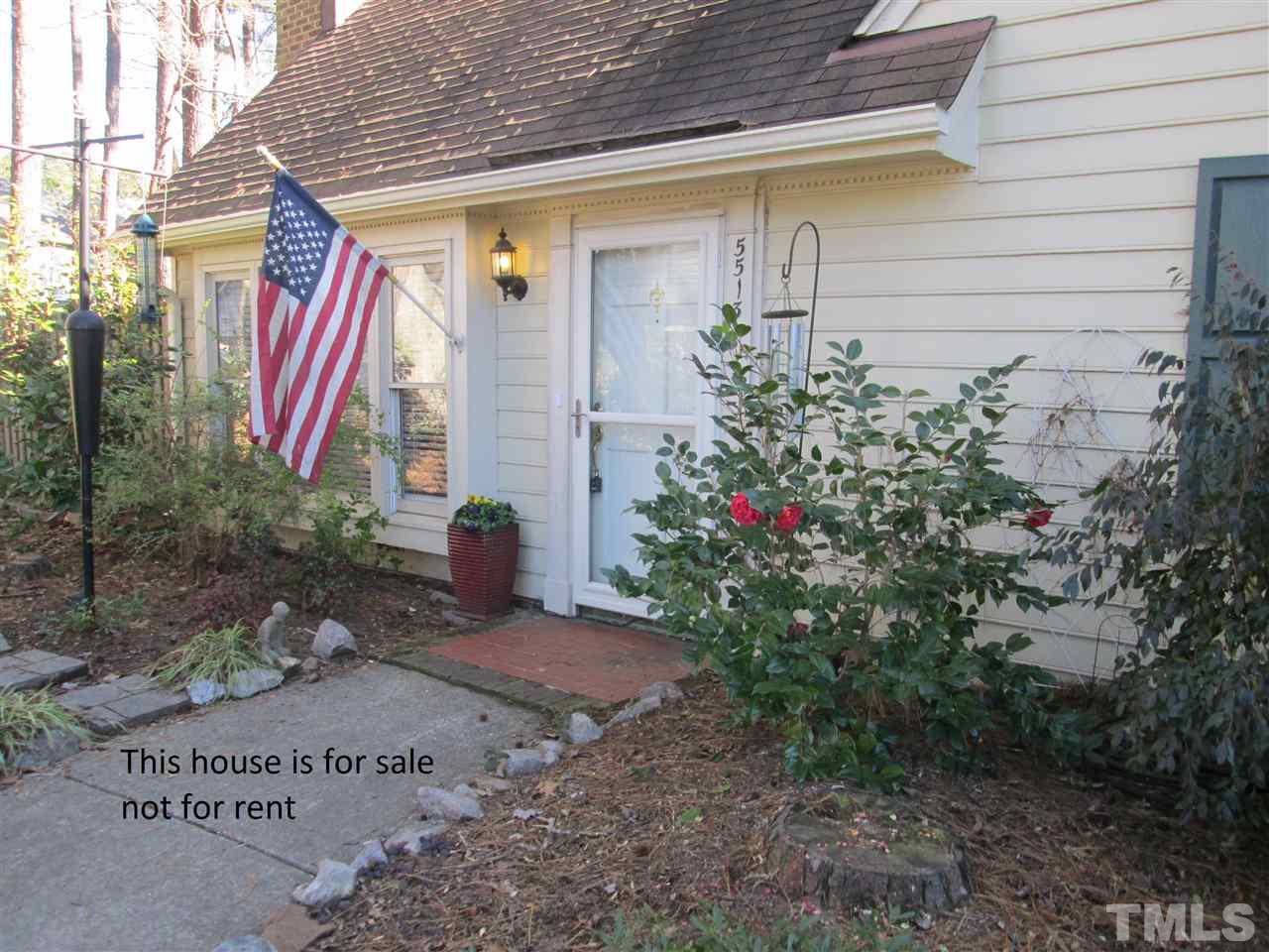 5513 Hamstead Crossing Raleigh, NC 27612 - Photo 3 of 30 a front view of a house with a yard and potted plants