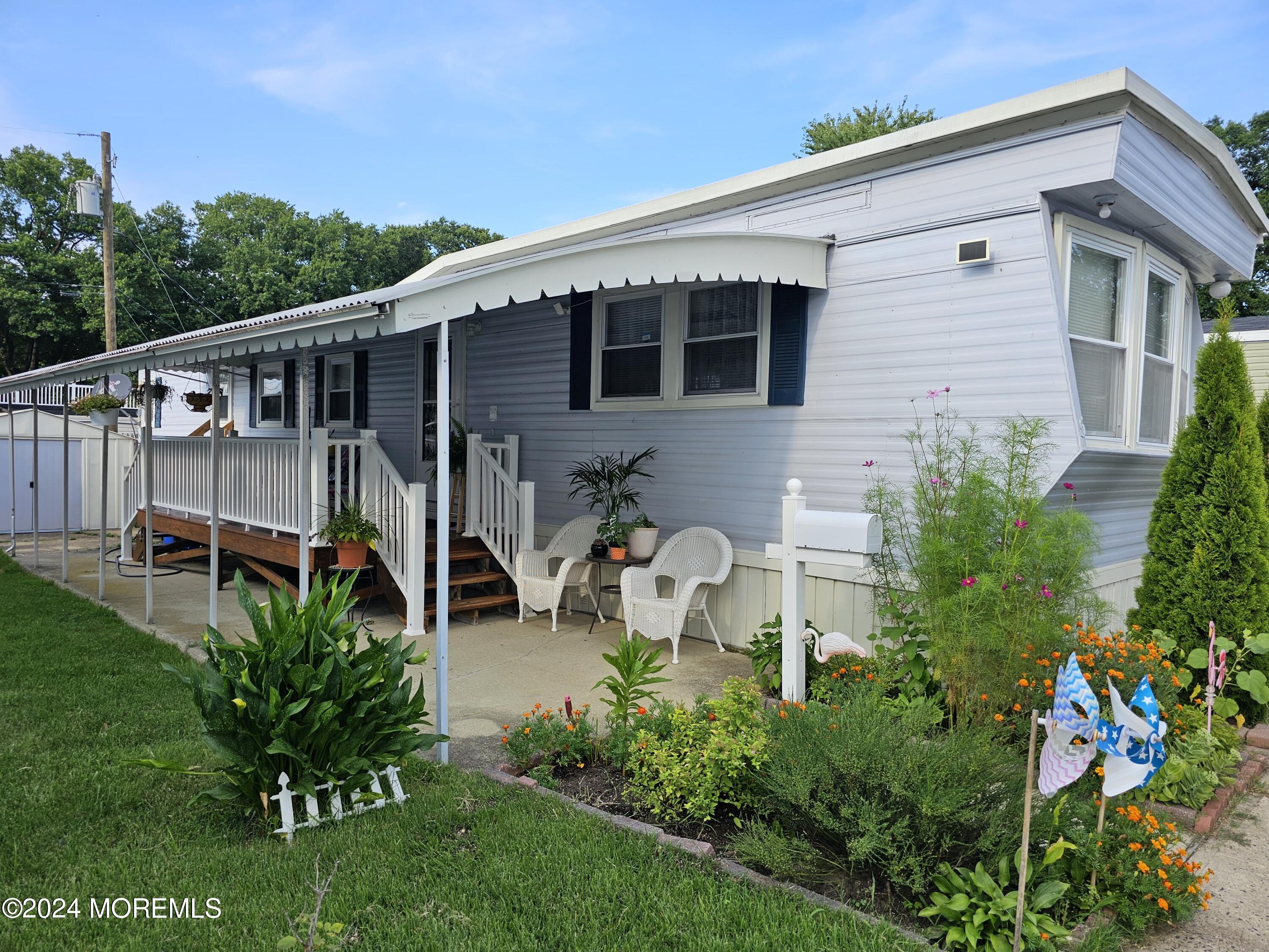 5 Kane Lane Middletown, NJ 07748 - Photo 2 of 23 a view of a house with patio