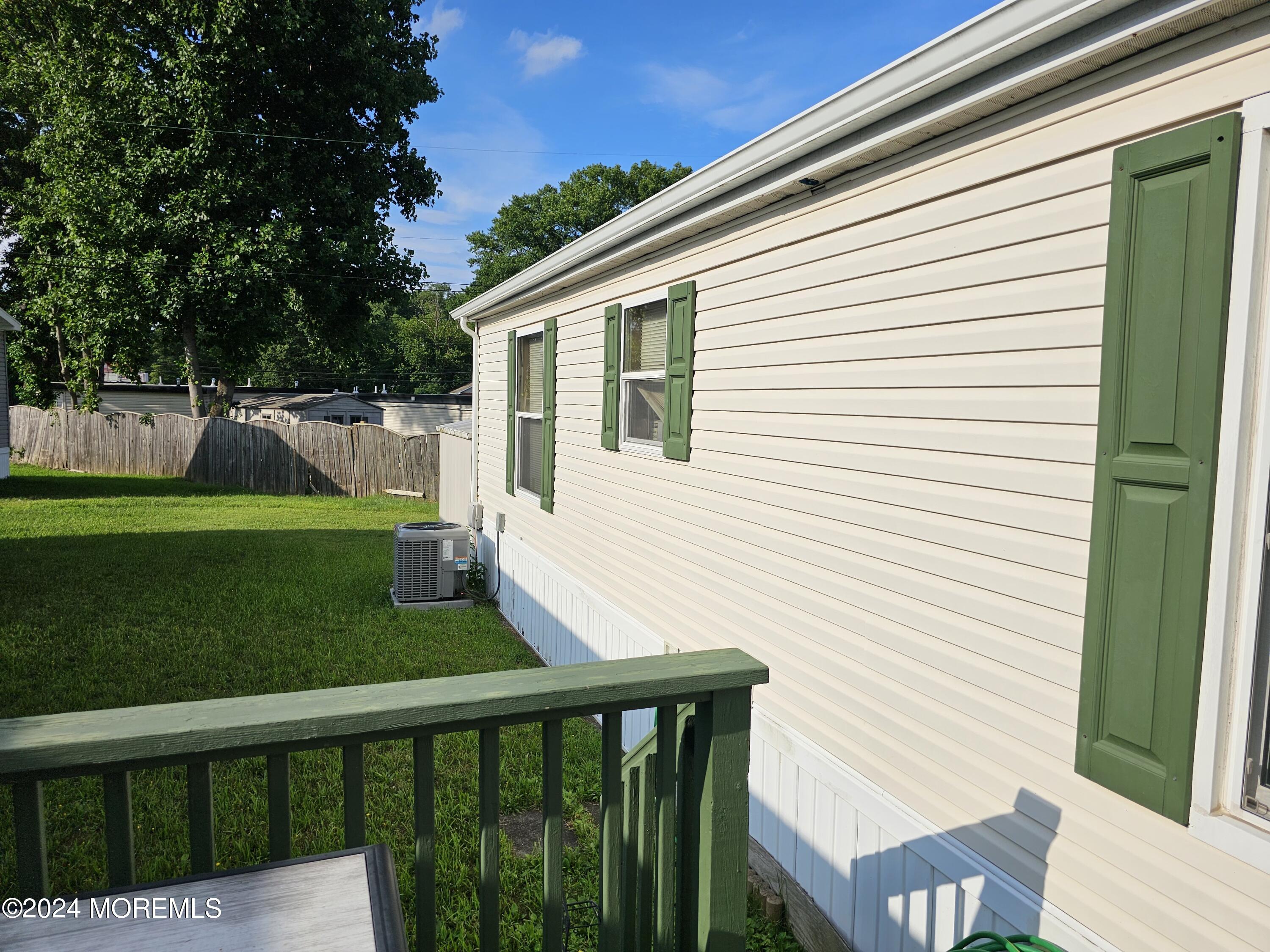 5 Kane Lane Middletown, NJ 07748 - Photo 21 of 23 a view of a house with backyard