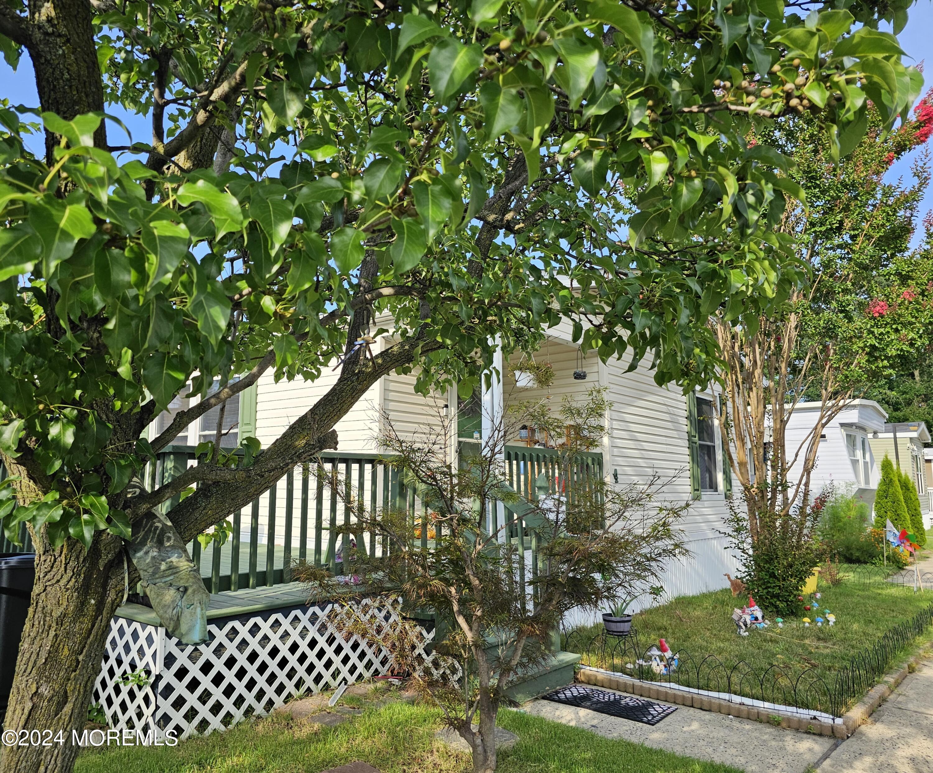 5 Kane Lane Middletown, NJ 07748 - Photo 3 of 23 a view of a yard