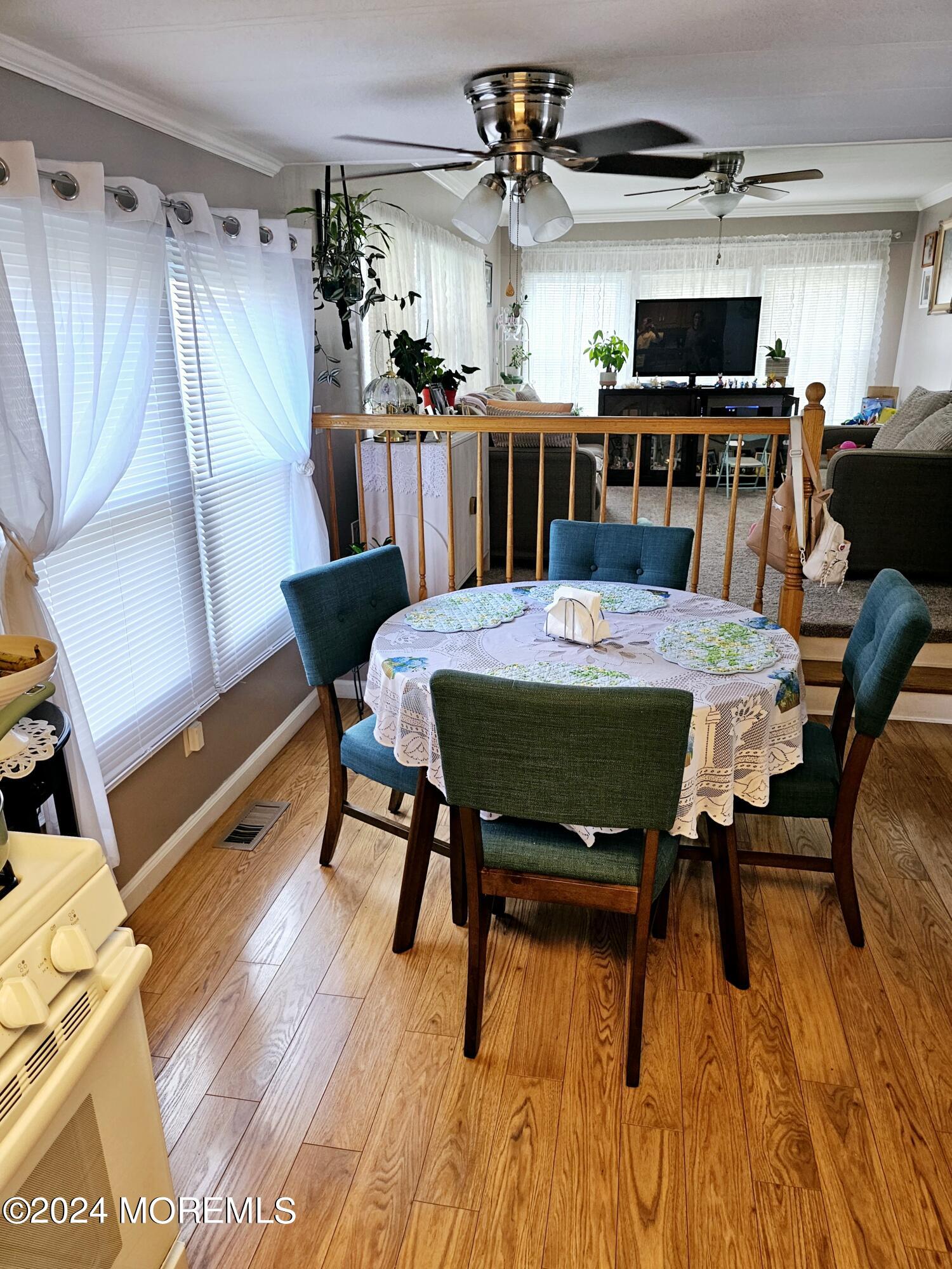 5 Kane Lane Middletown, NJ 07748 - Photo 8 of 23 a view of a dining room with furniture window and wooden floor