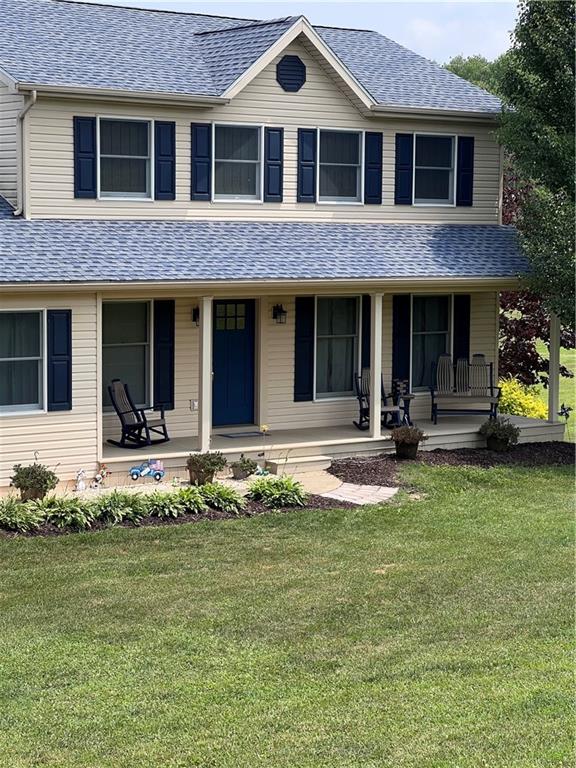 a front view of a house with garage