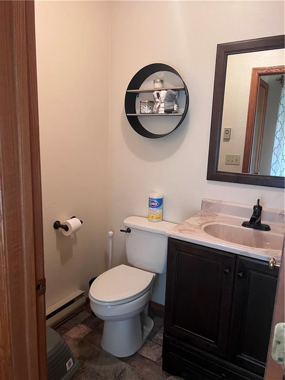 226 Hogback Road Kersey, PA 15846 - Photo 21 of 45 a bathroom with a toilet and a sink