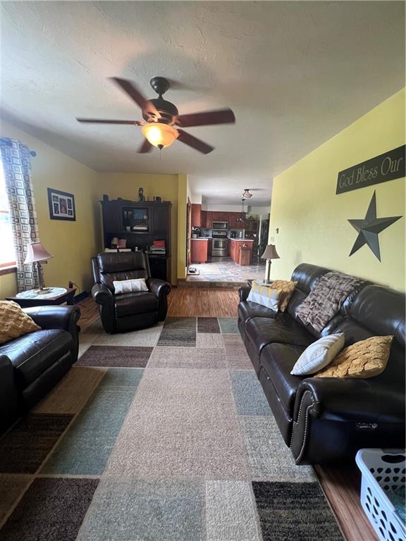 226 Hogback Road Kersey, PA 15846 - Photo 24 of 45 a living room with furniture and a fireplace