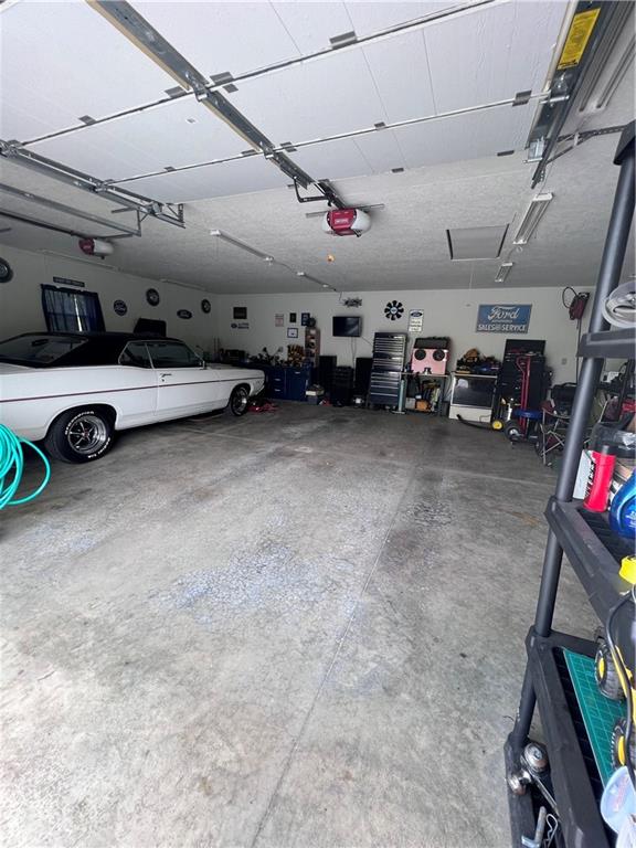 226 Hogback Road Kersey, PA 15846 - Photo 28 of 45 a view of a garage with parked cars