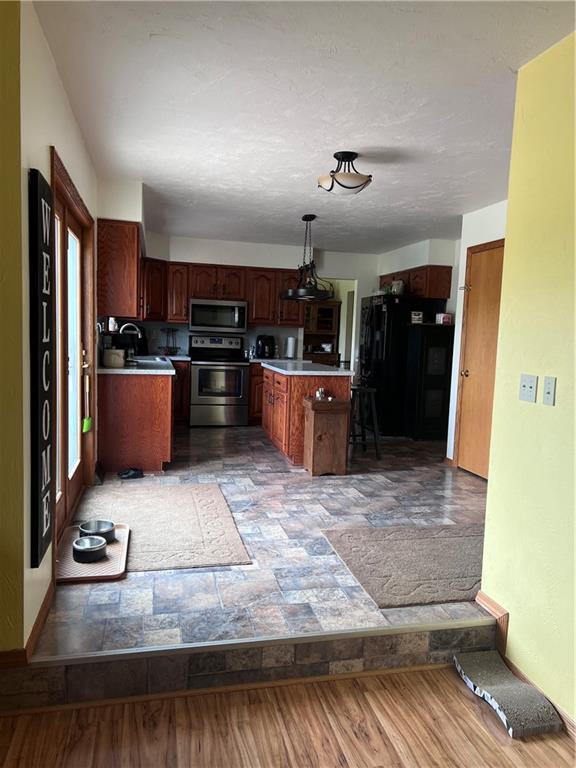 226 Hogback Road Kersey, PA 15846 - Photo 6 of 45 a kitchen with stove top oven and refrigerator