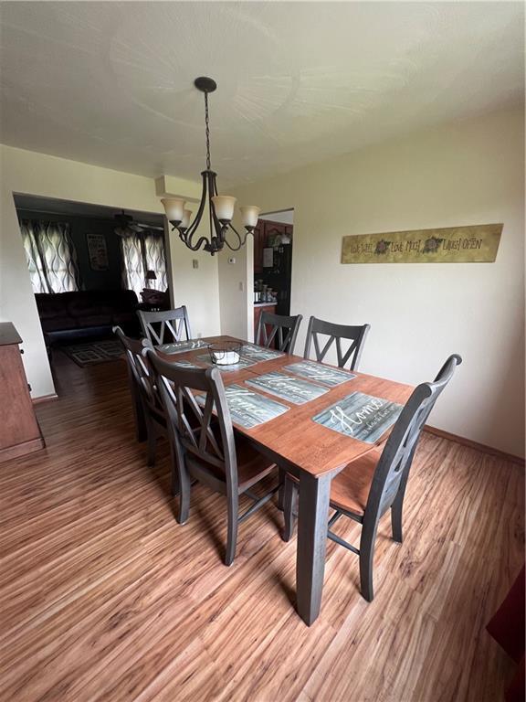 226 Hogback Road Kersey, PA 15846 - Photo 7 of 45 a view of a dining room with furniture and wooden floor