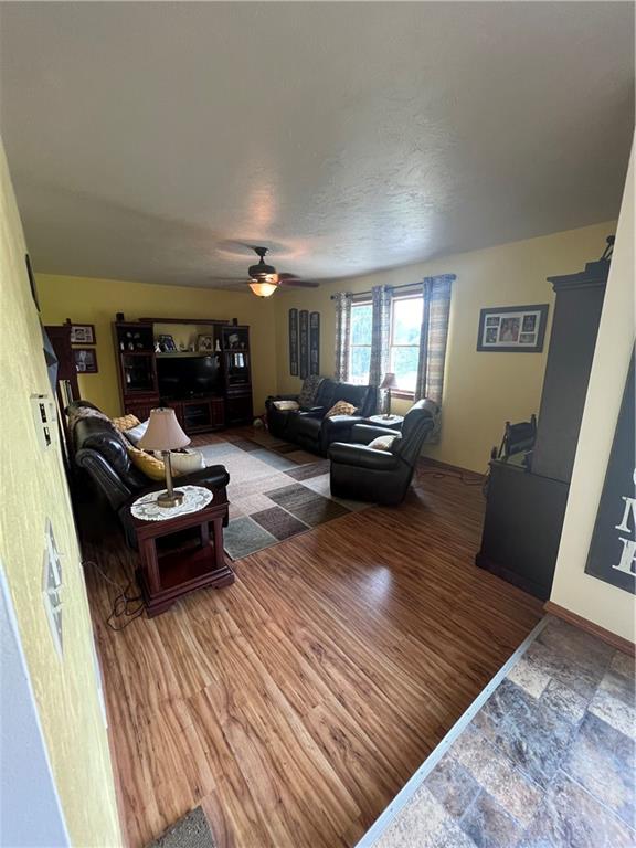 226 Hogback Road Kersey, PA 15846 - Photo 8 of 45 a living room with furniture and a fireplace