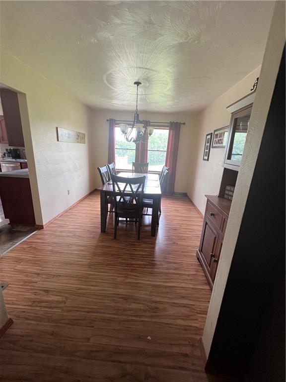 226 Hogback Road Kersey, PA 15846 - Photo 10 of 45 a view of a dining room with furniture window and wooden floor