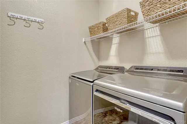 a close view of a sink and wooden floor
