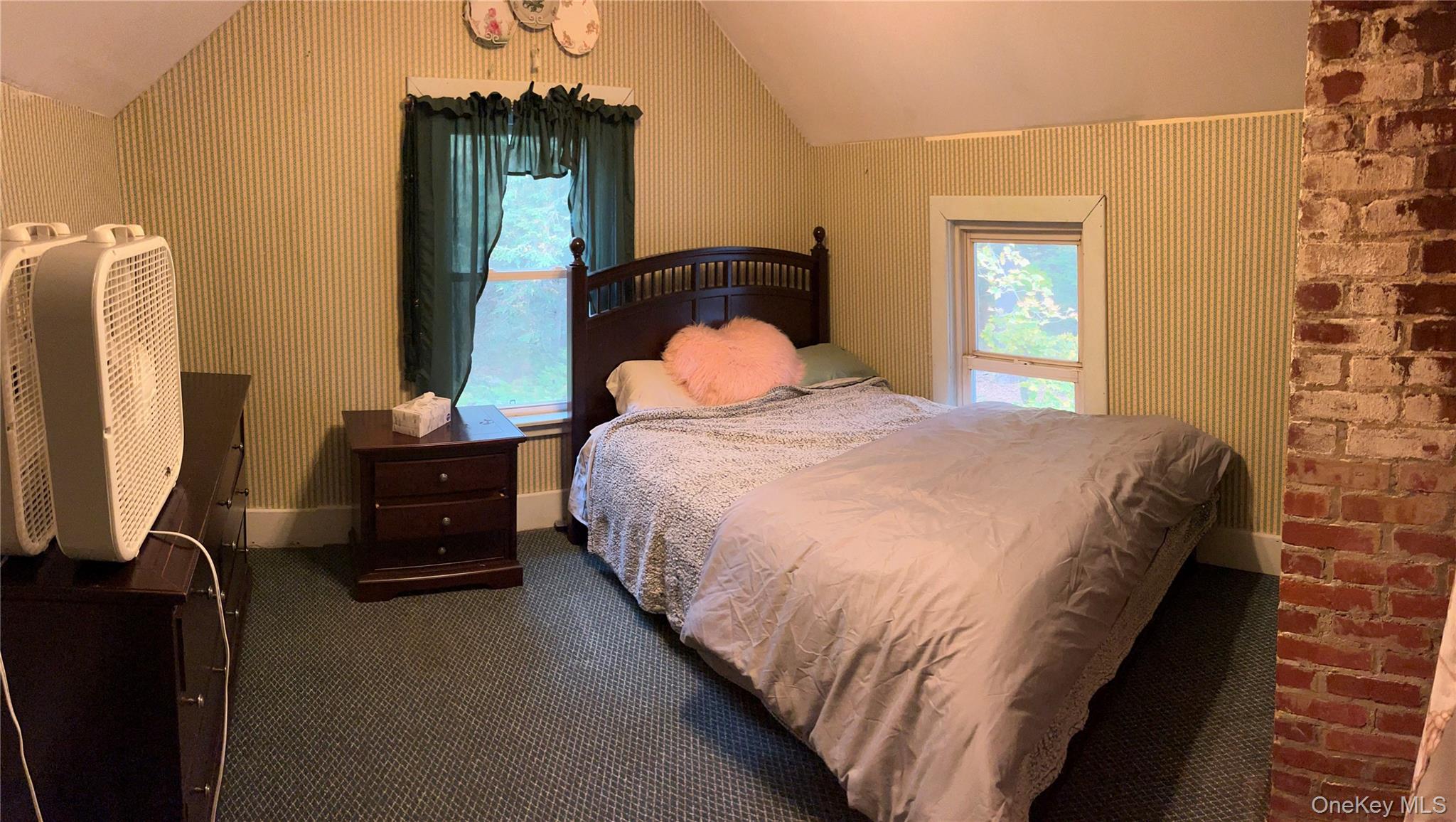 446 Shandelee Road Livingston Manor, NY 12758 - Photo 12 of 32 a bedroom with bed and window