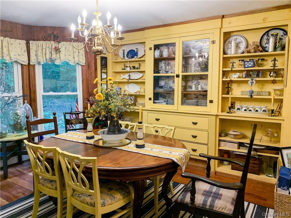 446 Shandelee Road Livingston Manor, NY 12758 - Photo 13 of 32 a view of a dining room with furniture window and outside view