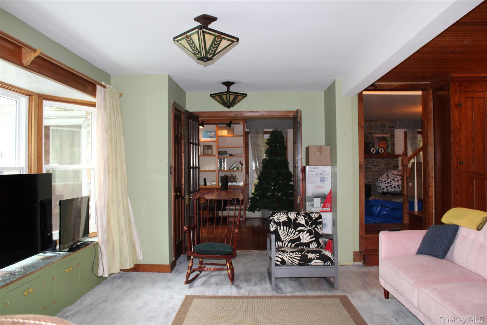 446 Shandelee Road Livingston Manor, NY 12758 - Photo 16 of 32 a view of a livingroom with workspace and a couch