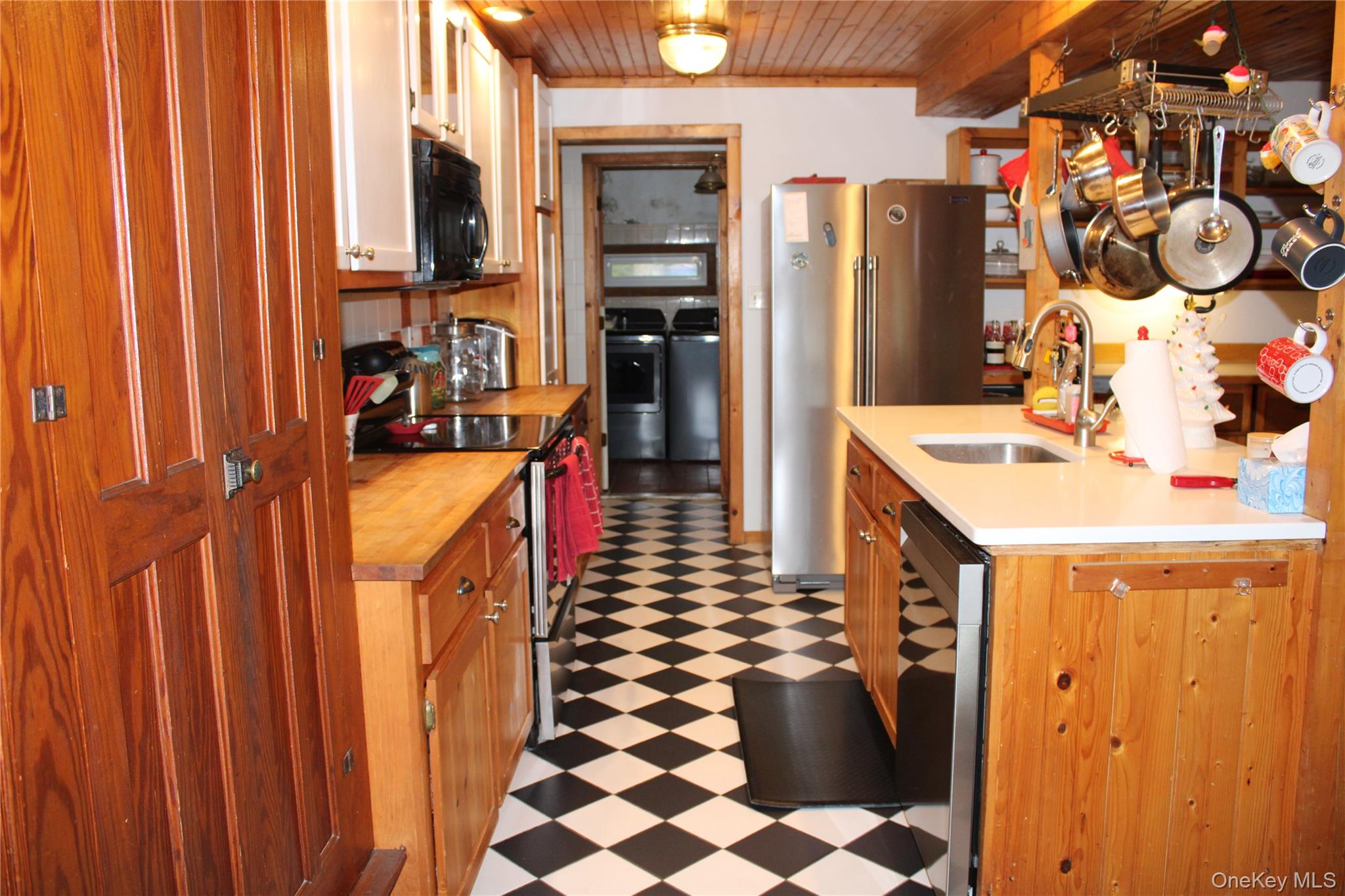 446 Shandelee Road Livingston Manor, NY 12758 - Photo 20 of 32 a hallway with a table and a chairs