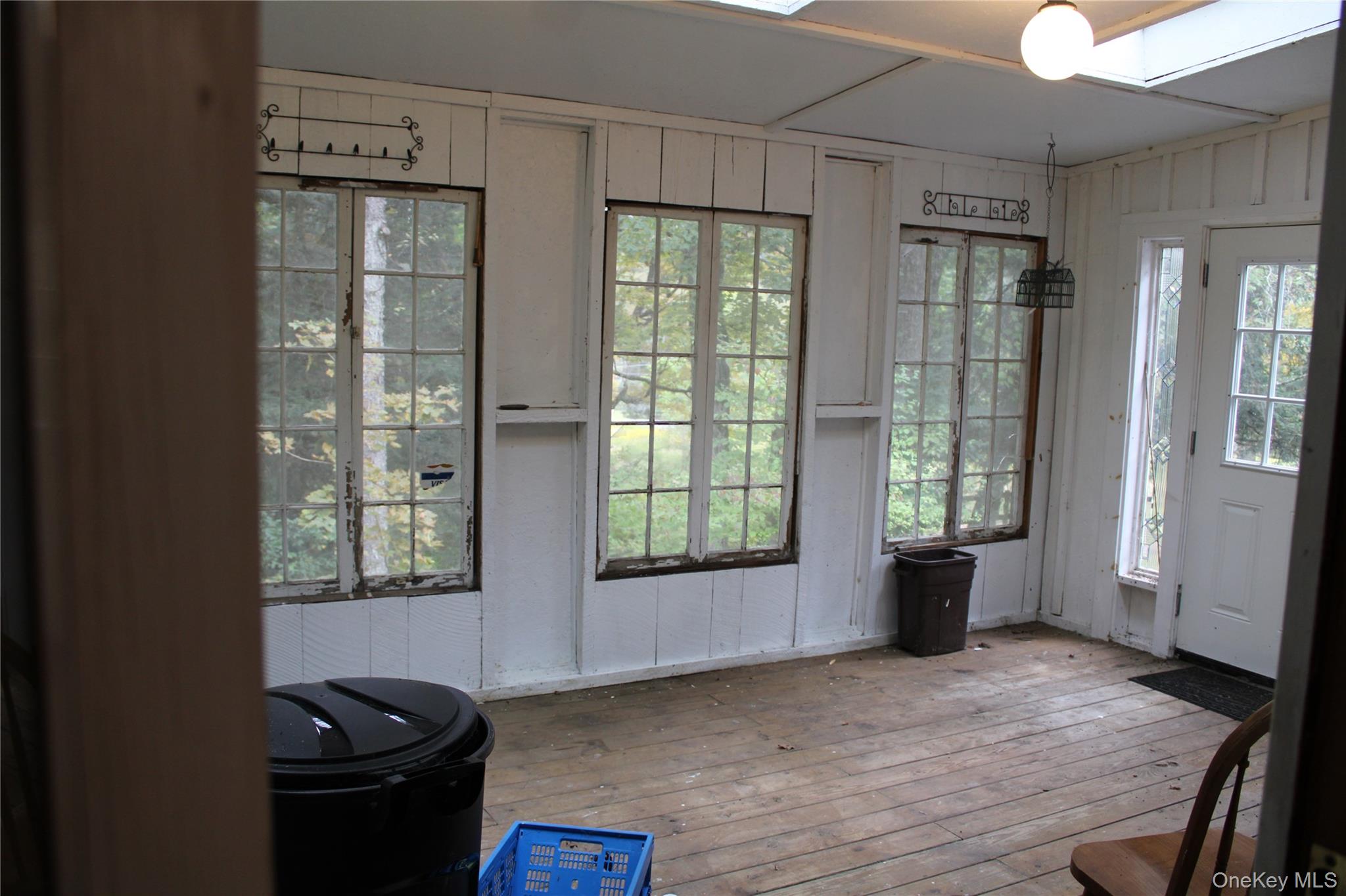 446 Shandelee Road Livingston Manor, NY 12758 - Photo 21 of 32 a view of a livingroom with furniture and window