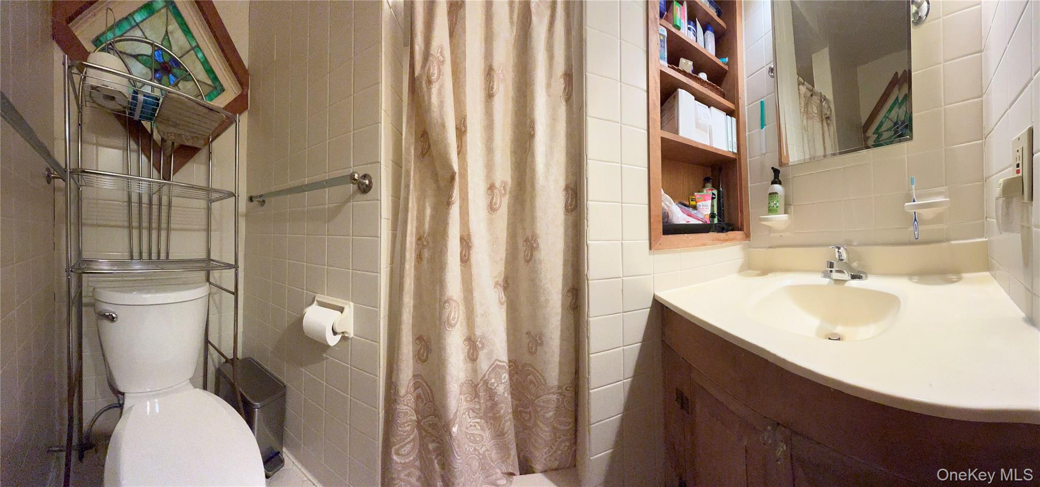 446 Shandelee Road Livingston Manor, NY 12758 - Photo 28 of 32 a bathroom with a sink toilet and shower