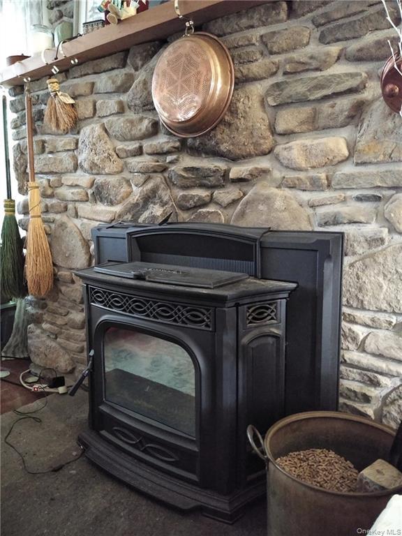 446 Shandelee Road Livingston Manor, NY 12758 - Photo 3 of 32 a stove top oven sitting inside of a kitchen