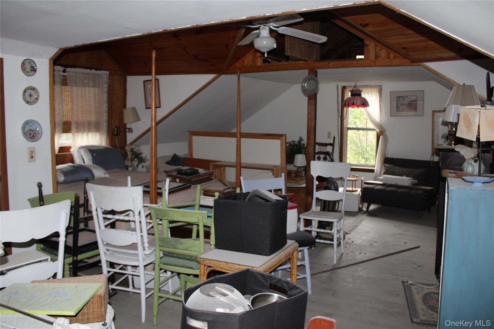 446 Shandelee Road Livingston Manor, NY 12758 - Photo 31 of 32 a view of a dining room with furniture window and outside view