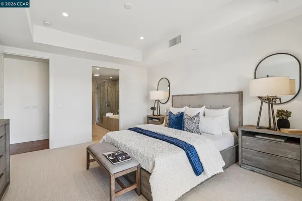 a bedroom with bed and a window