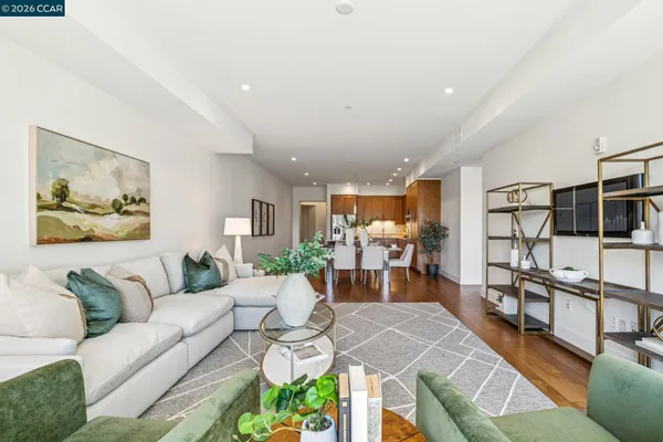 a kitchen with a sink and a potted plant