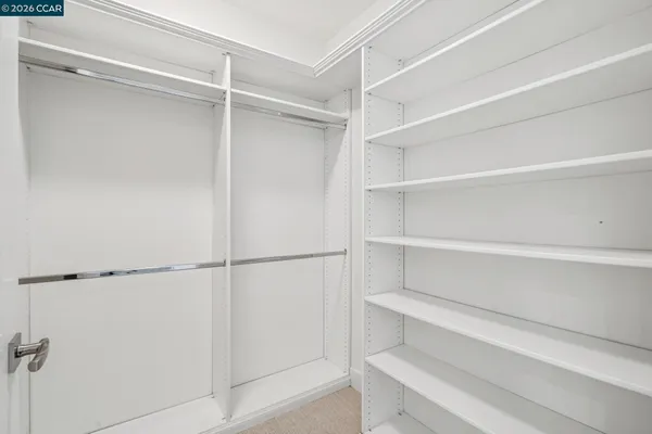 a view of a room with racks on the wall