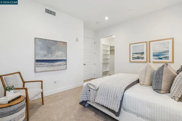 a bed room with a bed and a window