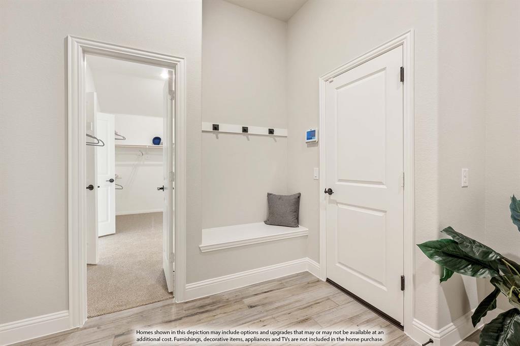 1148 Hitching Post Way Oak Point, TX 75068 - Photo 30 of 31 a view of a bathroom with a glass door shower
