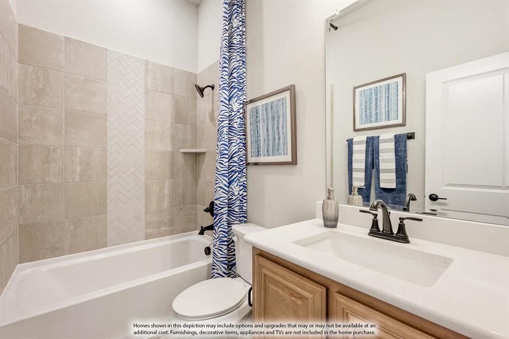 1148 Hitching Post Way Oak Point, TX 75068 - Photo 6 of 31 a bathroom with a sink toilet and shower