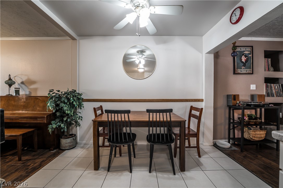 1324 Appaloosa Road Boulder City, NV 89005 - Photo 7 of 42 A welcoming dining area featuring practical tile flooring and an overhead ceiling fan.