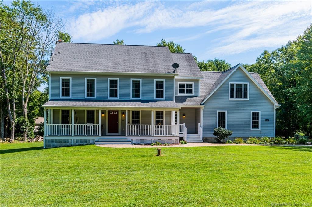 65 Witter Road Salem, CT 06420 - Photo 1 of 1 a front view of a house with garden