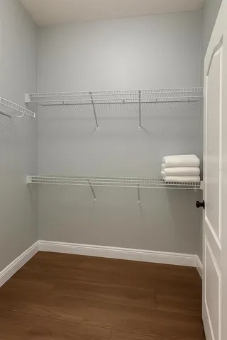 a view of a room with racks on the wall