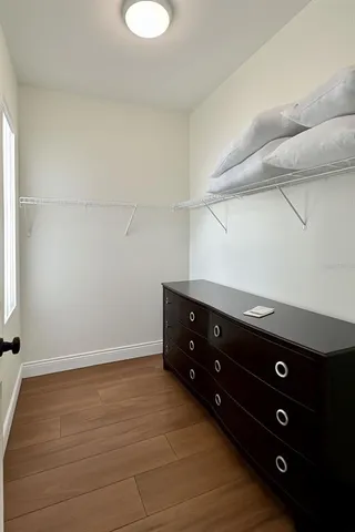 a room with a dresser