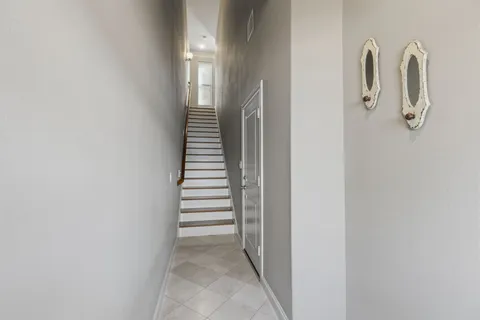 a view of a hallway with entryway