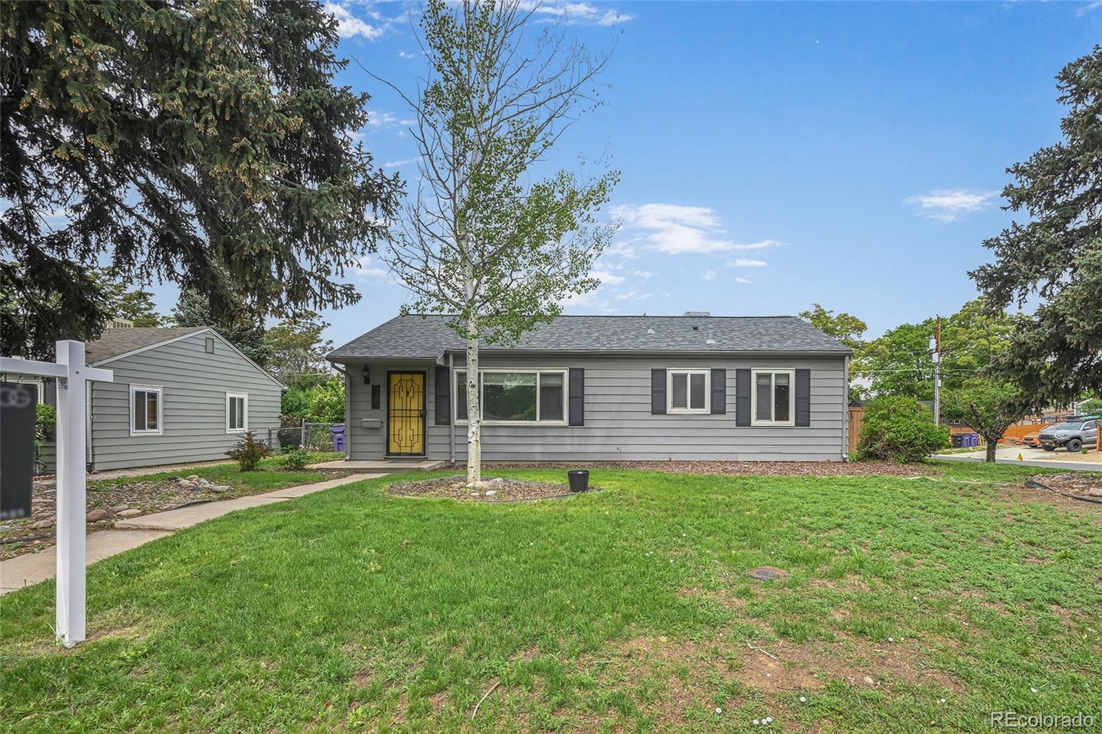 1801 South Eudora Street Denver, CO 80222 - Photo 1 of 18 a front view of house with yard and green space