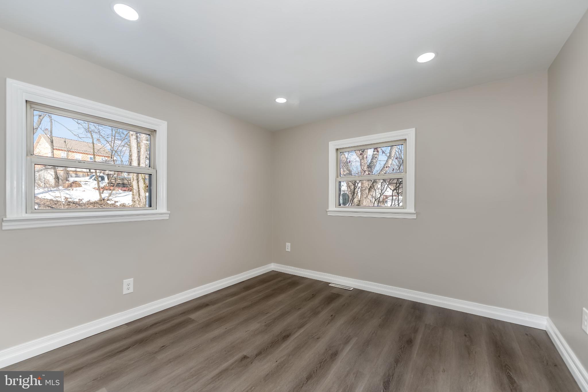 106 Rutherford Road Harrisburg, PA 17109 - Photo 14 of 27 a view of a big room with wooden floor and windows in a room